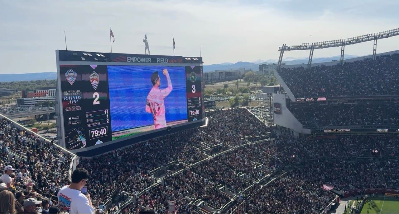Messi celebrating at Mile High Stadium